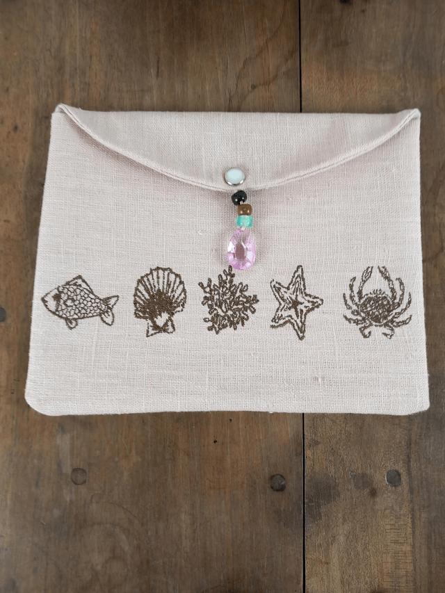 Trousse de maquillage en lin brodé