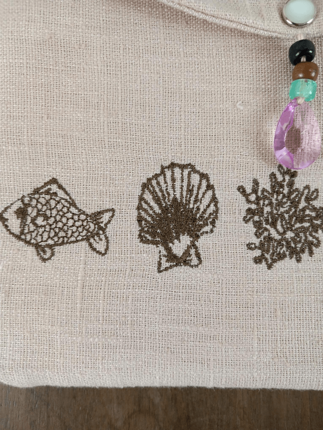 Trousse de maquillage en lin brodé