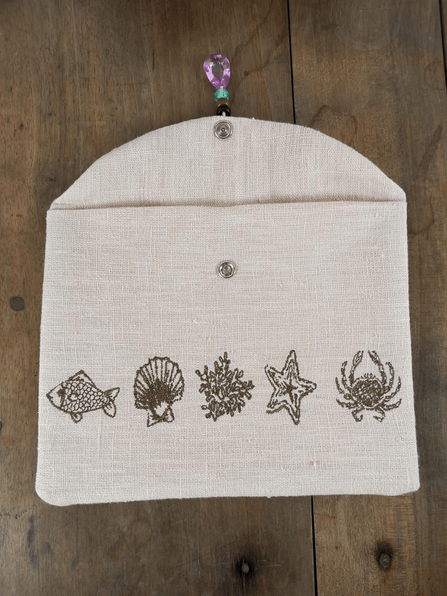 Trousse de maquillage en lin brodé