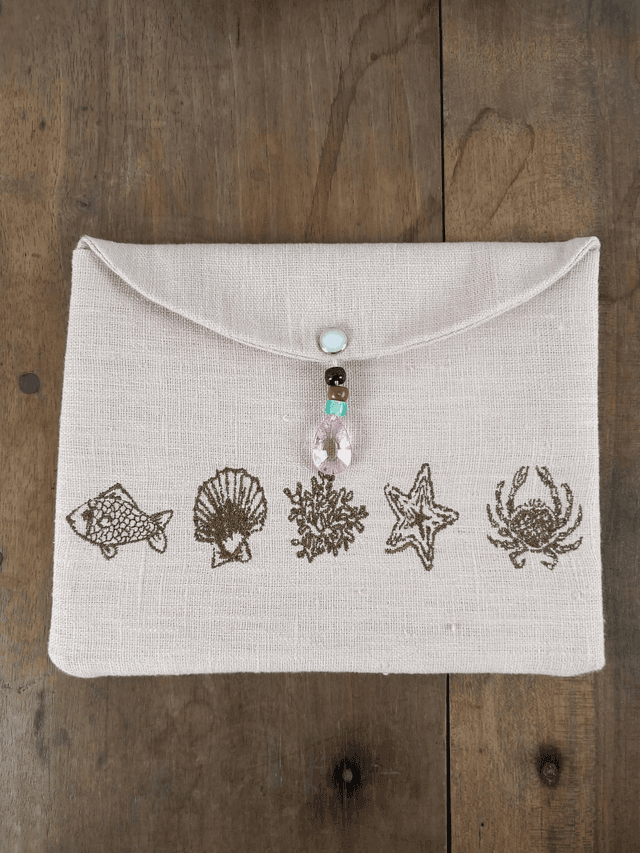 Trousse de maquillage en lin brodé